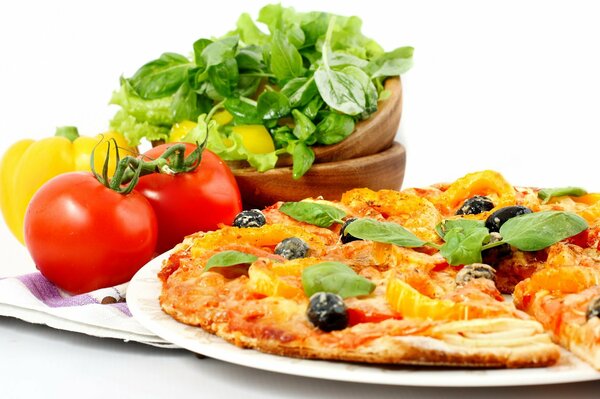 Italian pizza with vegetables and basil