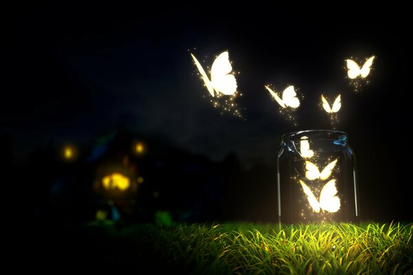 Papillons lumineux dans la nuit sur fond d herbe