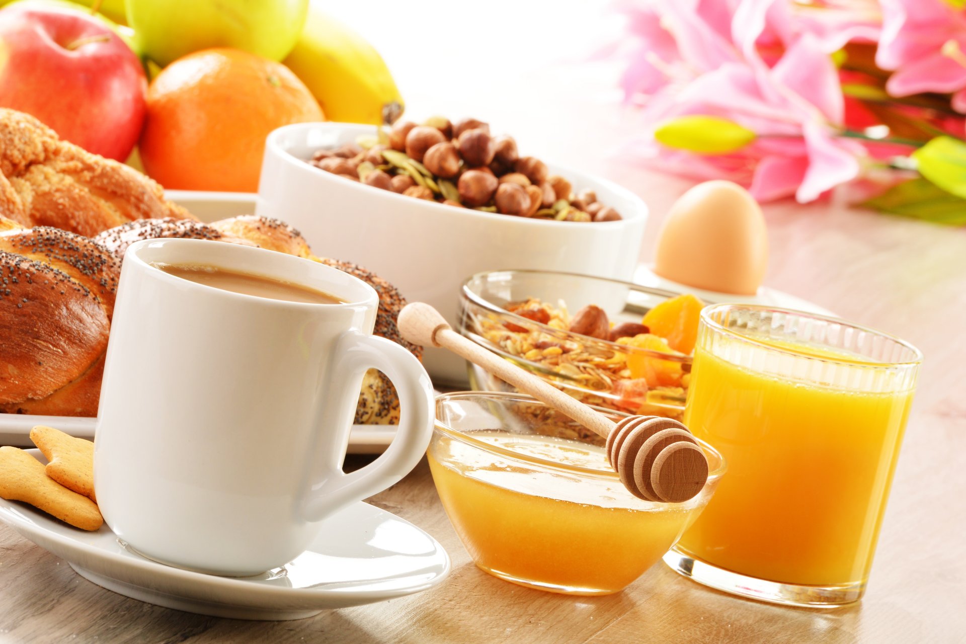 breakfast coffee cup saucer cookies honey spoon cereals apricots fruits nuts juice orange baking buns food