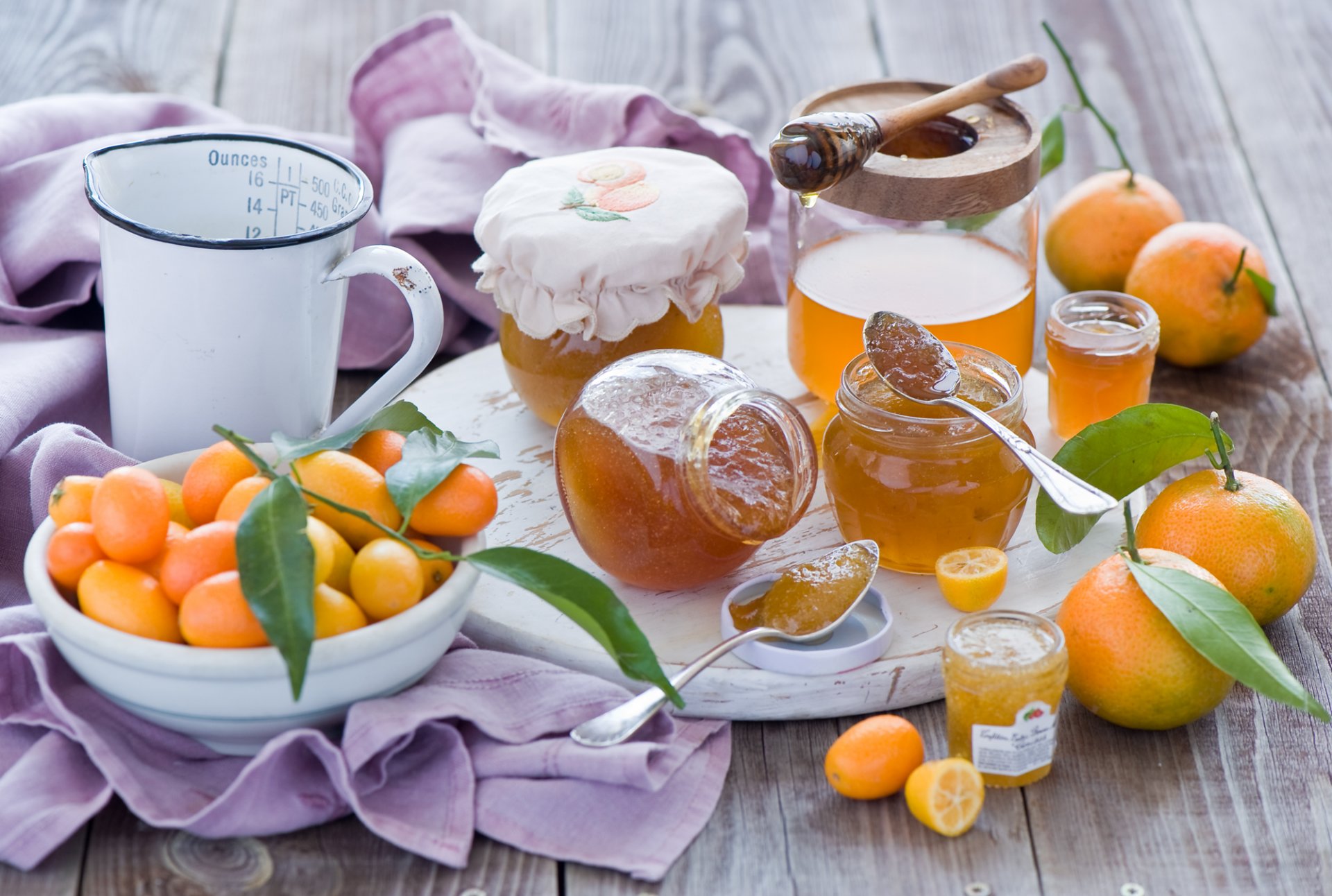 jams jam jars spoon mandarins kumquat fruits orange citrus leaves segments still life winter anna verdina