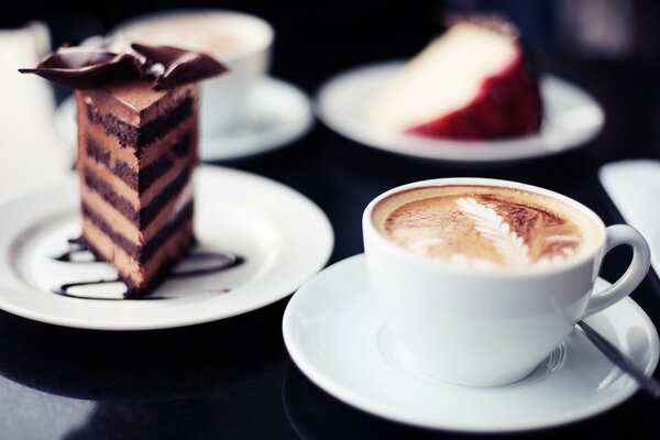 Cappuccino with a piece of cake with chocolate