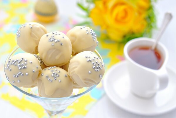 Delicate white chocolate candies with delicious sprinkles