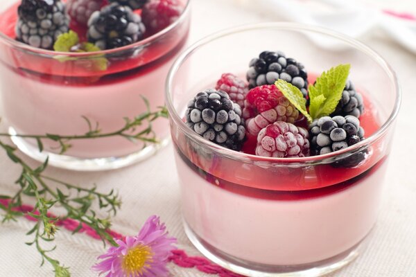 Dessert in a glass with blueberries and raspberries