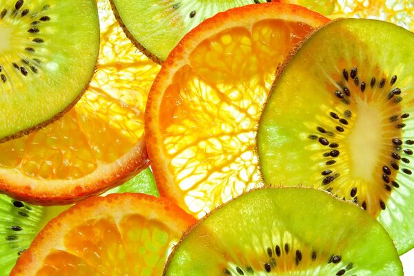Bright kiwi fruits and juicy orange