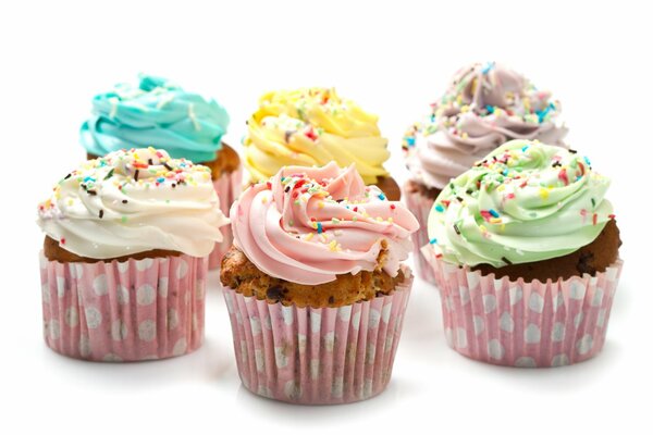 Cupcakes decorated with multicolored cream