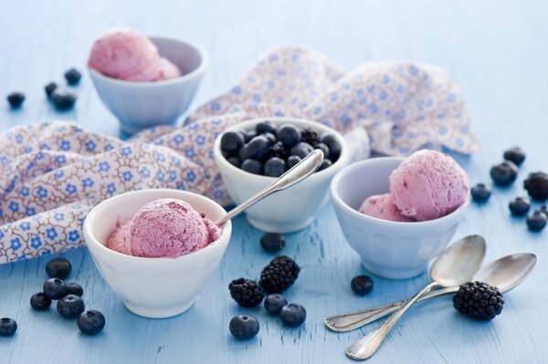 Ice cream balls in blueberry cremans