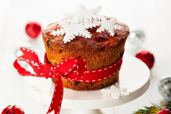 Festive cupcake for Christmas decorated with snowflakes