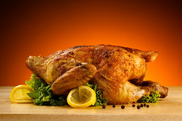 Baked chicken with lemons and salad