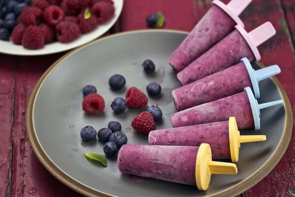 Fruit ice cream on a platter with fresh berries