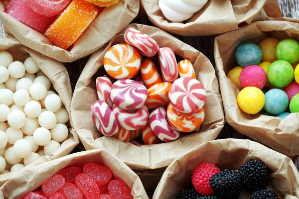 Sweet assorted sweets in paper bags