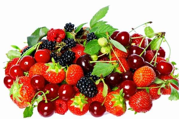 Strawberries, cherries, blackberries and raspberries on a white background