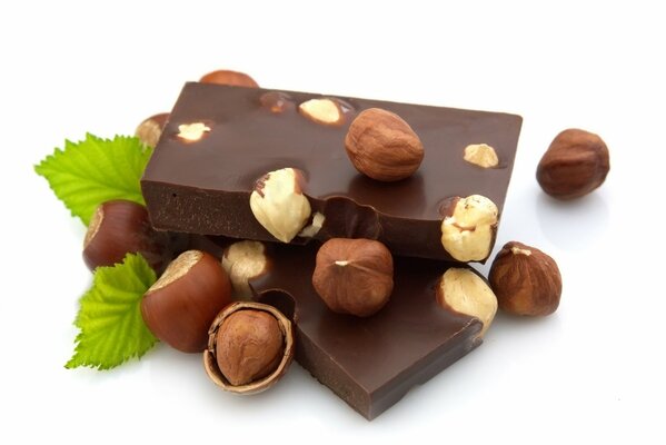 Chocolate with mint leaves and hazelnuts