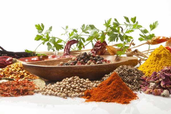 The image of spices on a white table