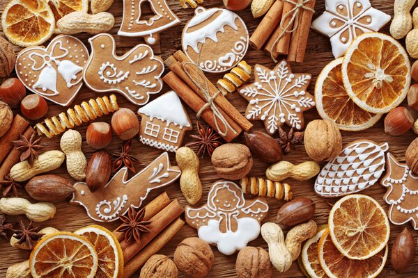 Christmas cookies and gingerbread with nuts and citrus fruits