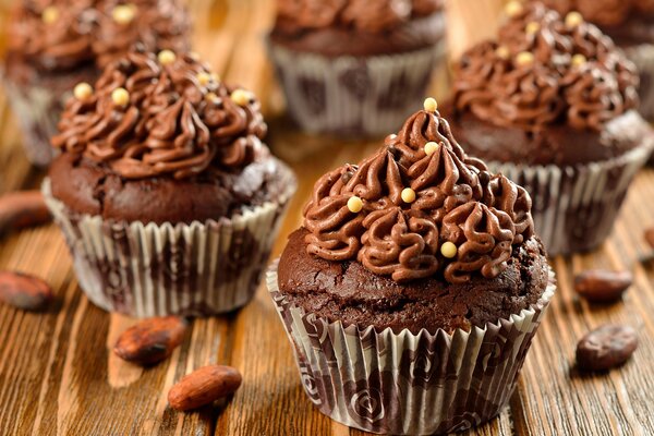 Chocolate cupcakes with cream peas