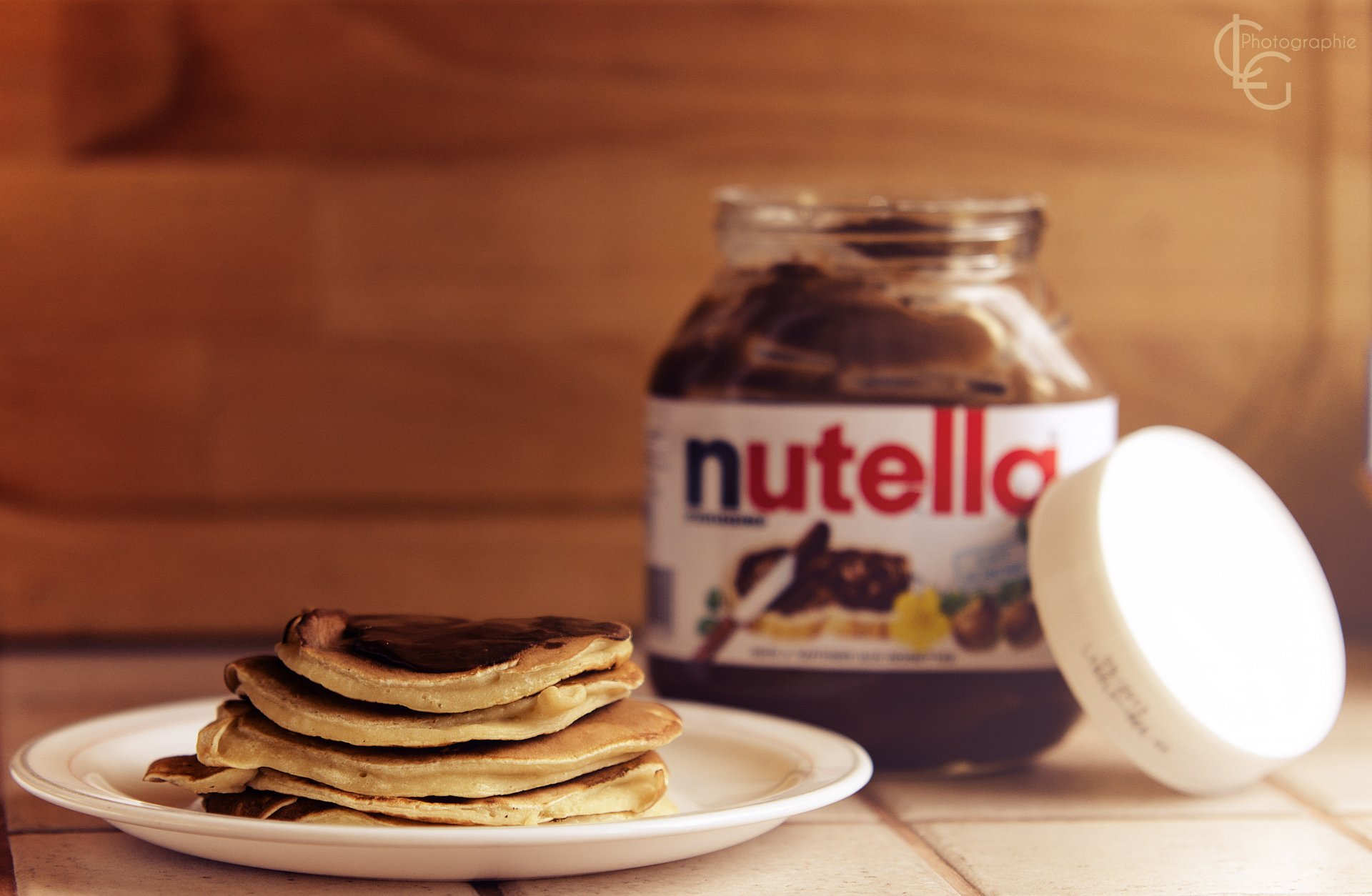 plate pancakes pancakes nutella cream