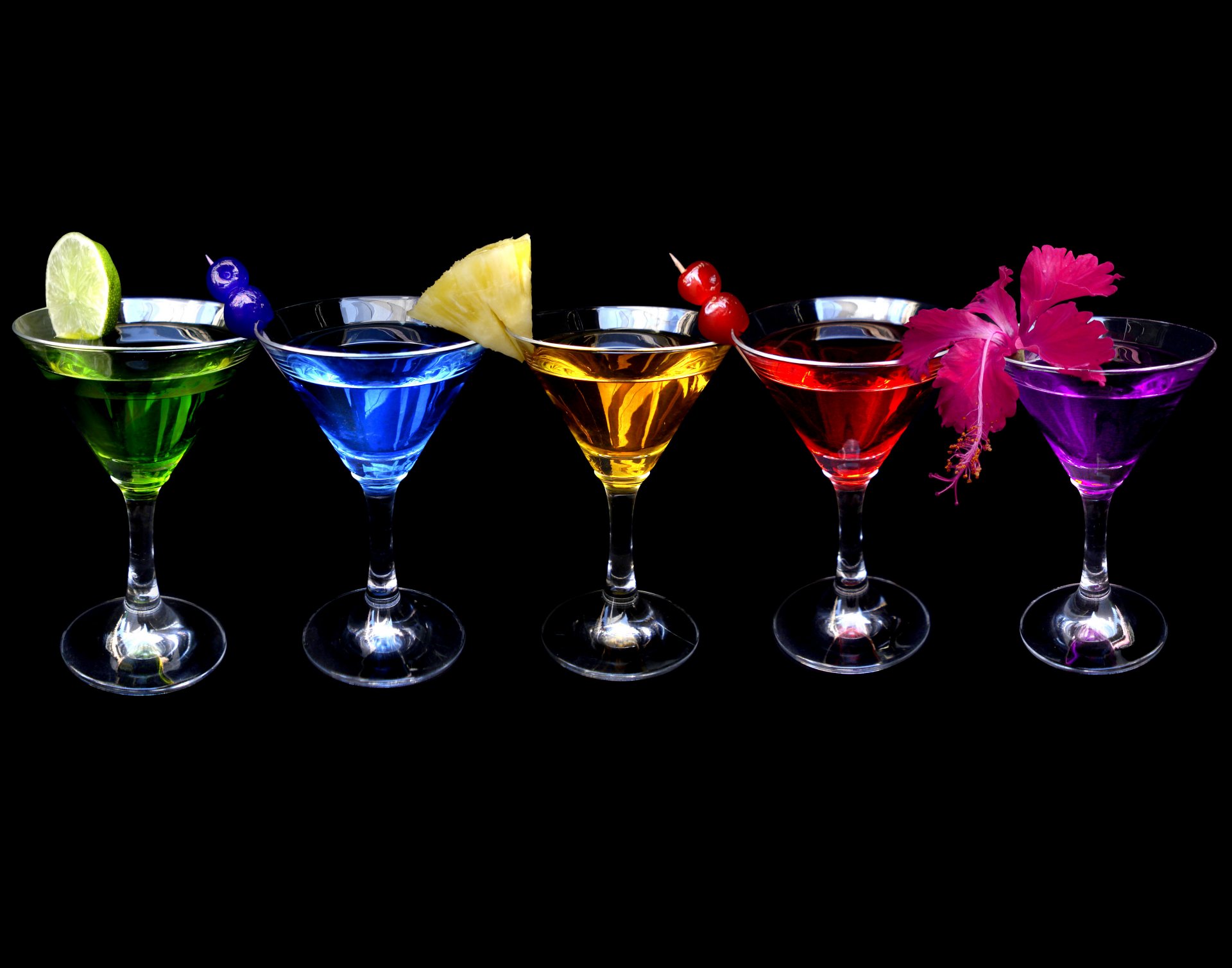 cocktail fruits flower black background