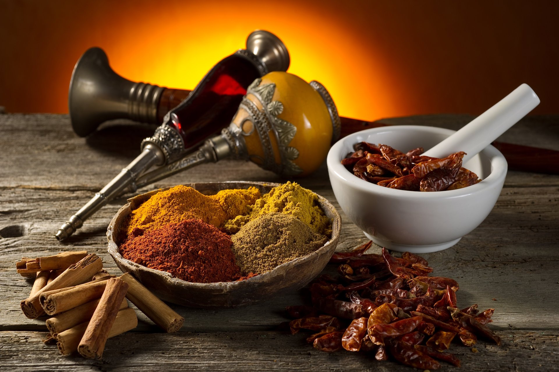 table spices mortar curry red pepper cinnamon