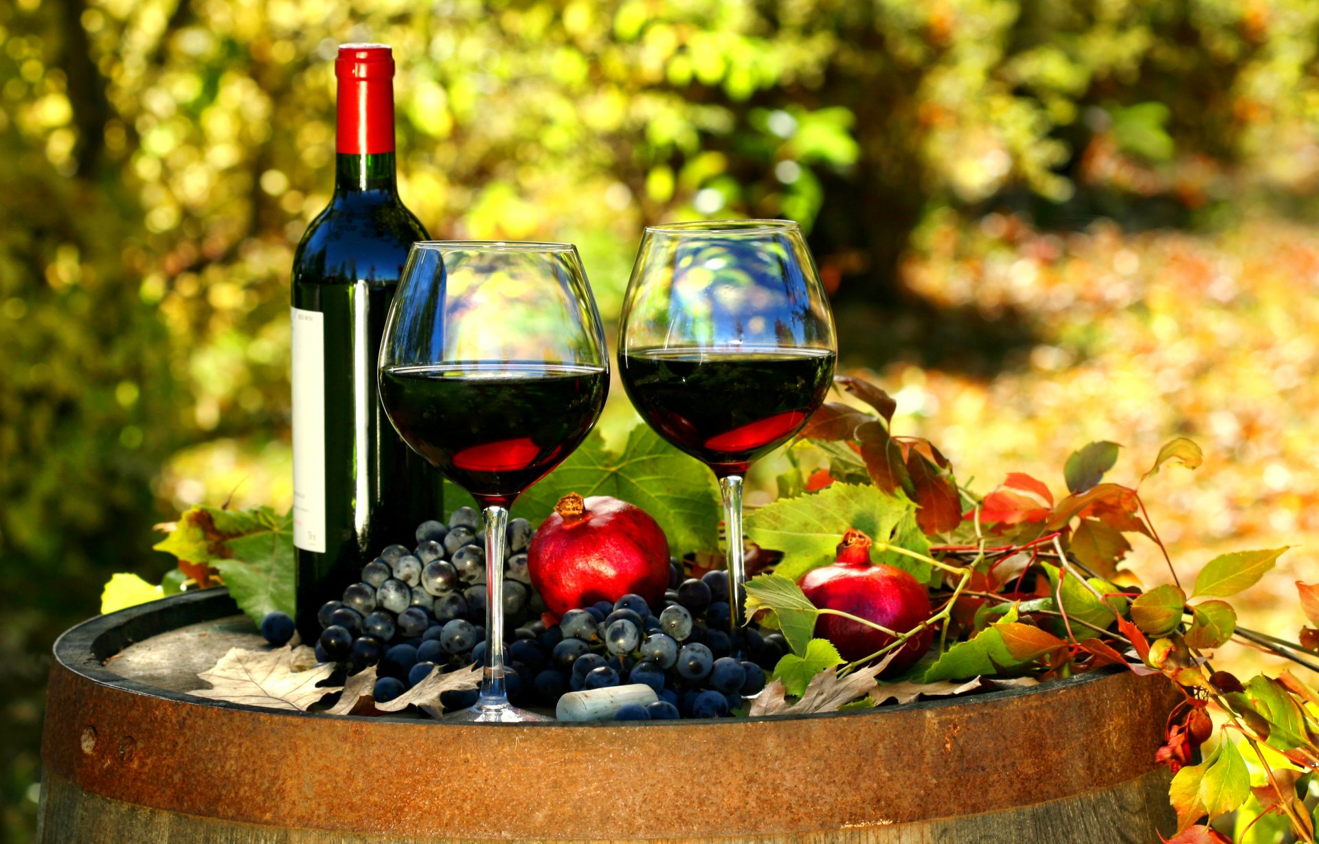 wine red glasses a bottle barrels grapes grenade leaves autumn