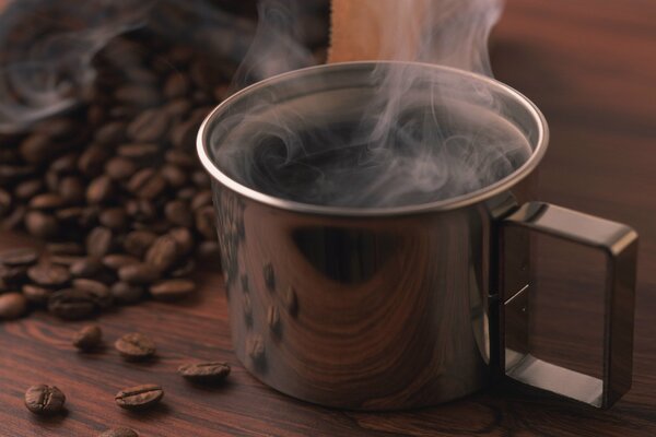 Hot coffee in a metal mug