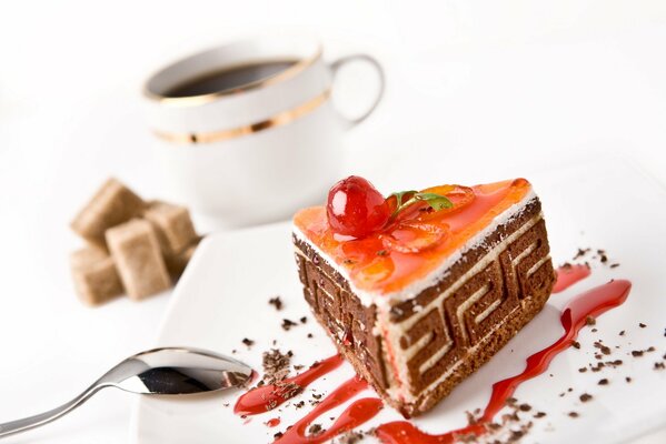 Sur une plaque blanche gâteau au chocolat avec des cerises