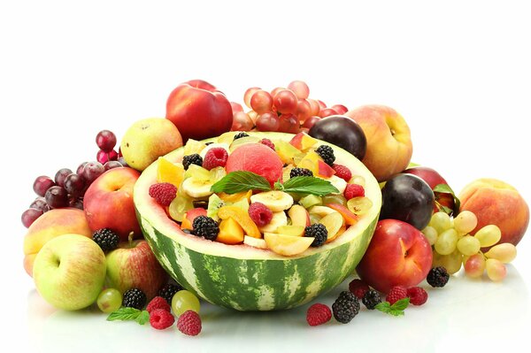 Salad of different fruits in watermelon, watermelon plate