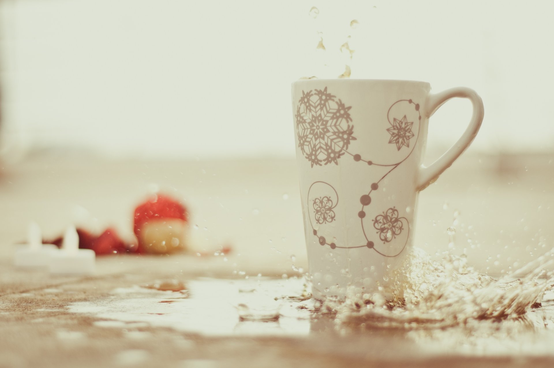 water cup snowflakes drops spray blur