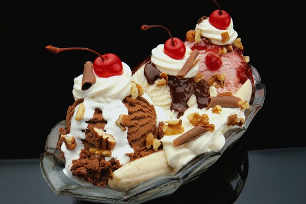 Ice cream with cherries, bananas and nuts