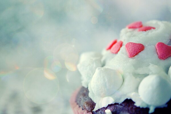 Airy cake with a heart made of glaze
