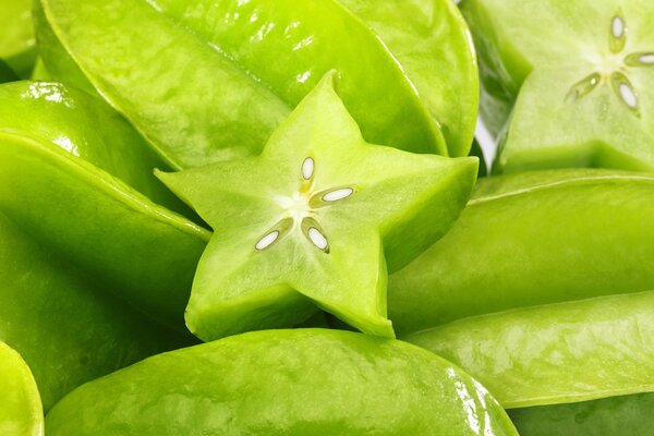 Green tropical carambola in the section