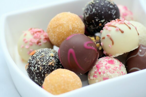 Round candies in a square plate