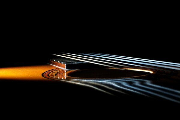 Detailed shooting of an acoustic guitar