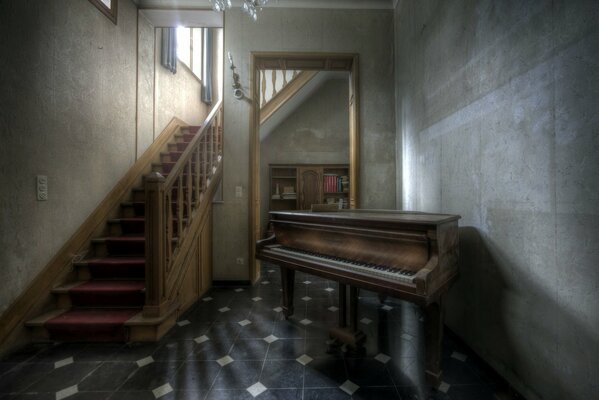 Piano in the hall of the old house