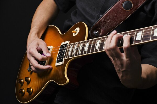 Guitare électrique et mains closeup