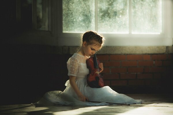 Niña tocando el violín