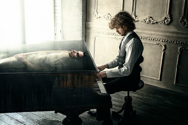 Beautiful photo shoot of a pianist with a girl inside the piano