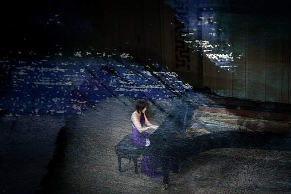 Picture of a girl in a purple dress playing the piano