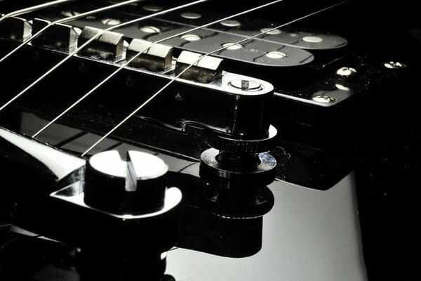 Strings on a lacquered guitar