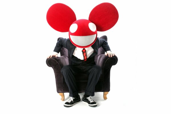 The man in the red mouse mask