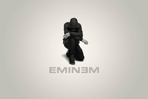 Couverture de l album Eminem sur ses genoux en marron