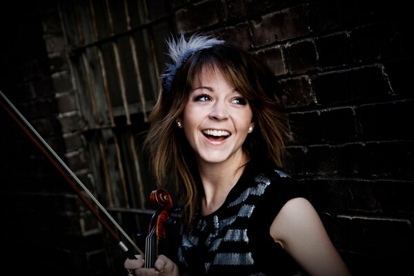 The smiling famous Lindsay stirling