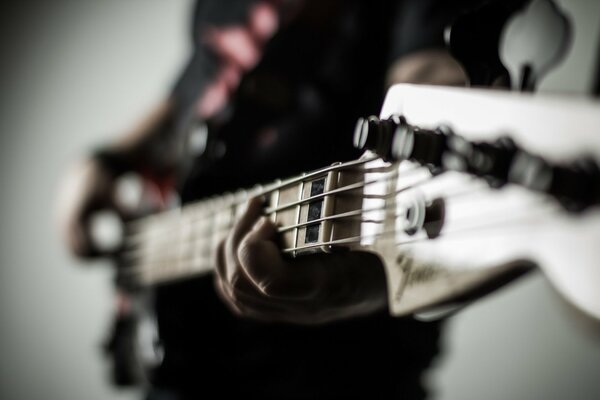 A close-up image of a guitar