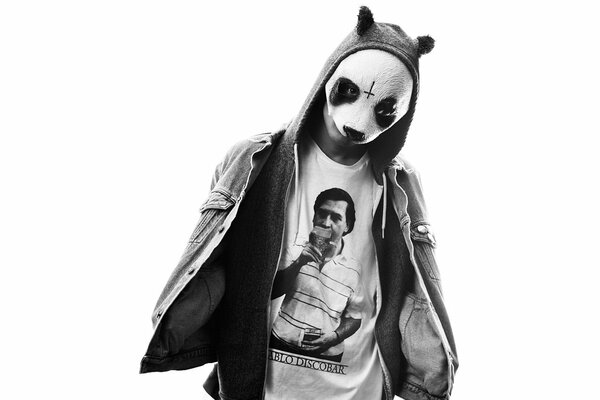 A guy in a jacket and a panda mask