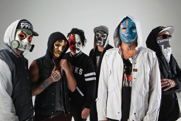 A group of serious guys in masks
