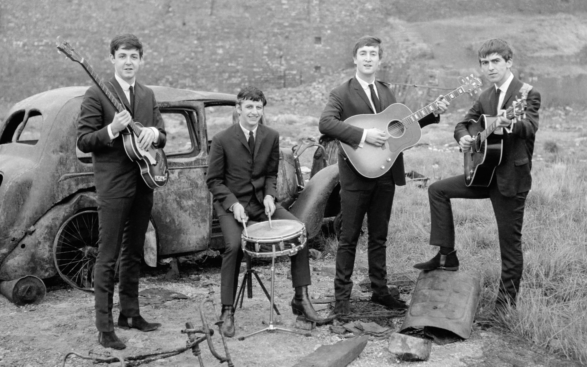 banda beatles fotografía blanco y negro máquina oxidada