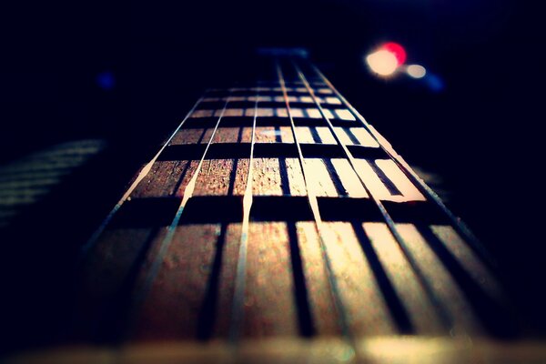 Guitar strings, Frets on the neck