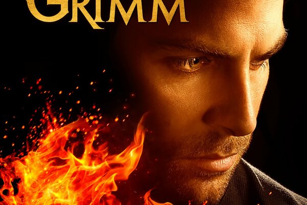 Poster with fire for the film Grimm