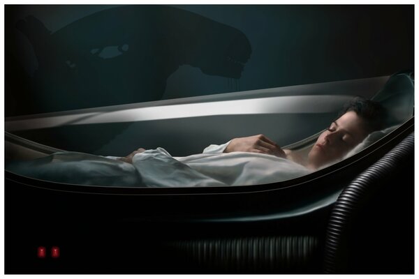 Sleeping woman in a closed capsule