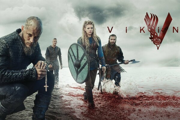 Personajes de la serie vikingos caminando sobre un mar manchado de sangre