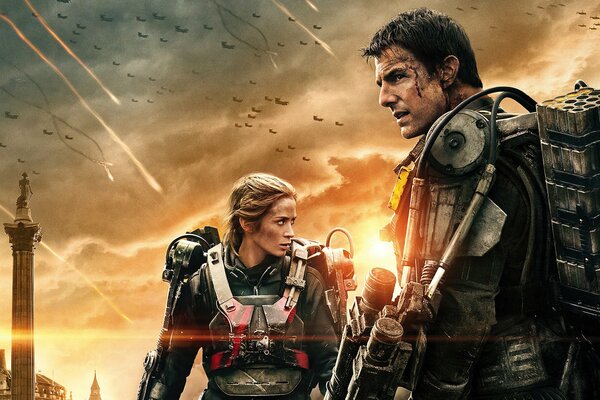 A shot of a fantastic movie with actors in exoskeletons Emily Blunt and Tom Cruise